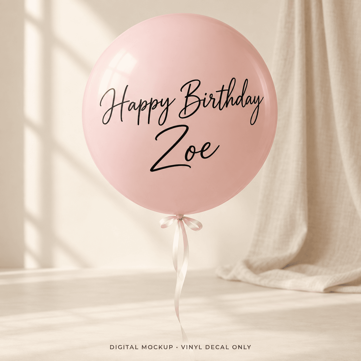 Digital mockup: Black "Happy Birthday Zoe" lettering on a blush balloon. Vinyl decal only; props are not included.