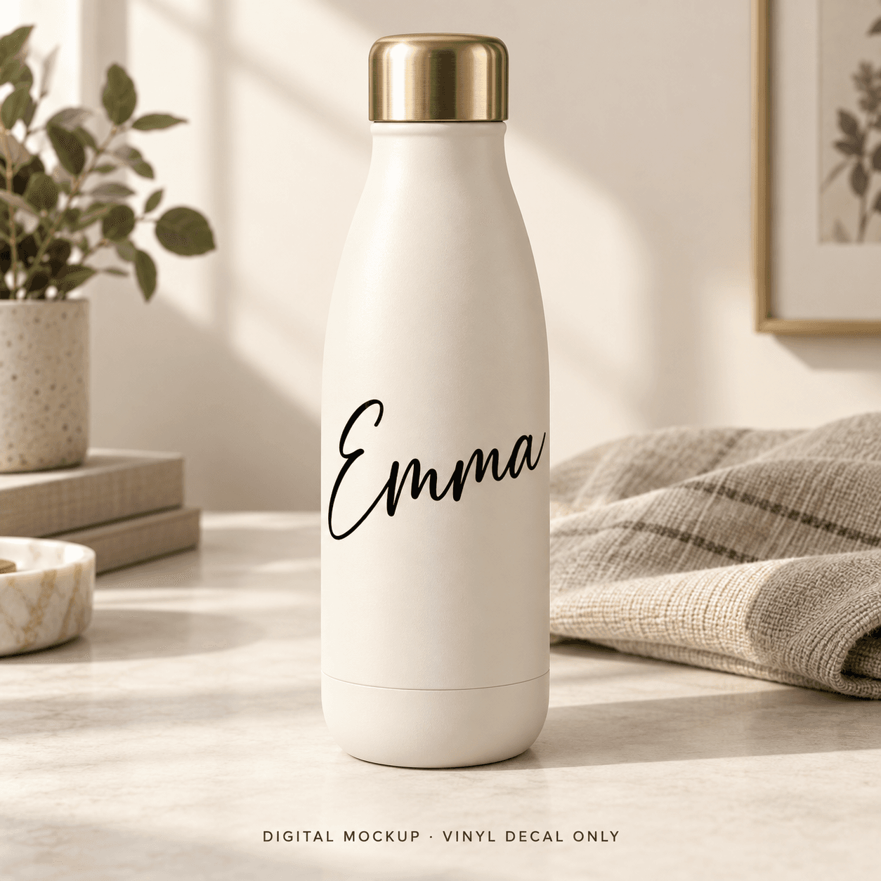 Digital mockup: Black script name "Emma" on an ivory bottle. Vinyl decal only; props are not included.